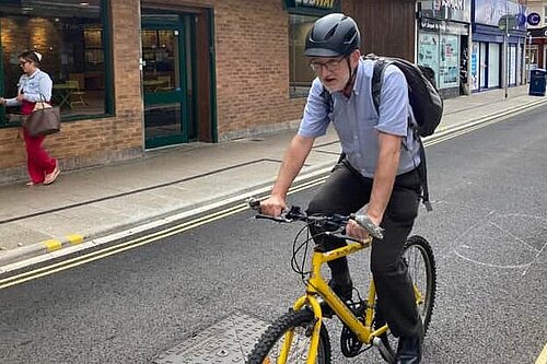 Cllr Peter Candlish cycling through Portsmouth