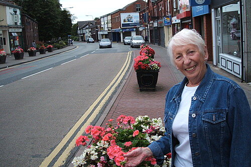 Celia admiring the planters in Stockton Heath