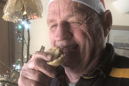 Jim Candy eating Christmas mince pie