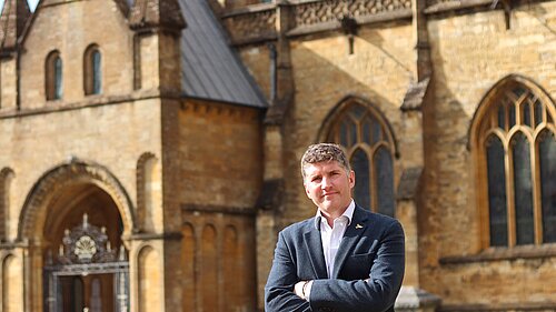 Edward Morello stood in front of Sherborne Abbey