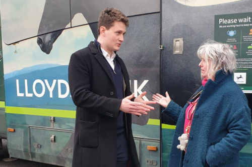 David Chadwick in front of a Lloyds Mobile Bank