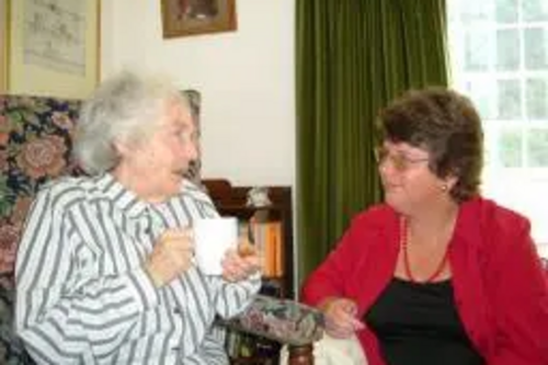 Dr Anne Lee discussing the needs of older people with Elisabeth Elton, a Woking resident, Elderly, old