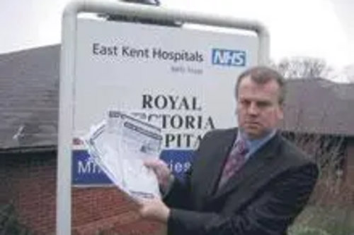 Peter Carroll outside the Royal Vic with some of the petitions he collected