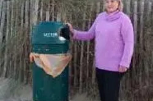 ann birchmore with a litter bin