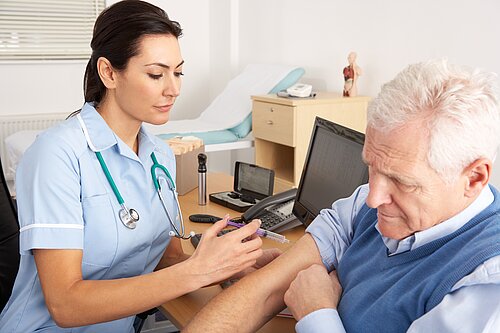 A nurse giving an injection