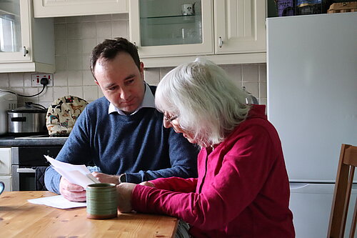 Danny with pensioner and fuel bill