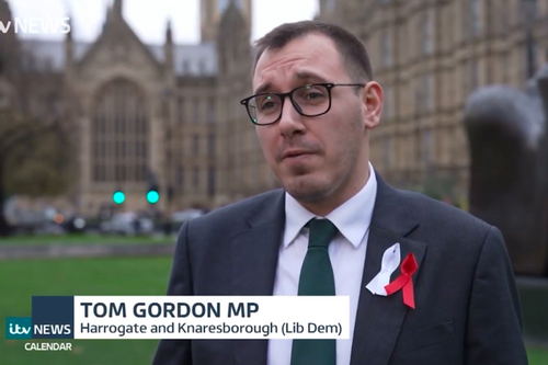 Tom Gordon when he appeared on ITV Calendar news, stood outside the Houses of Parliament