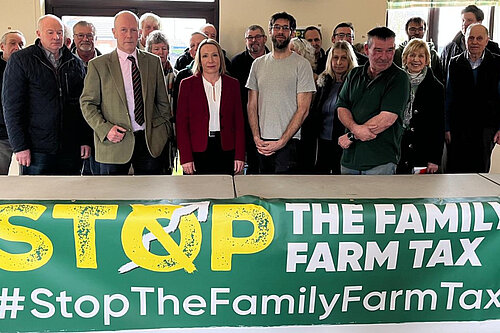 Helen with farmers at the meeting