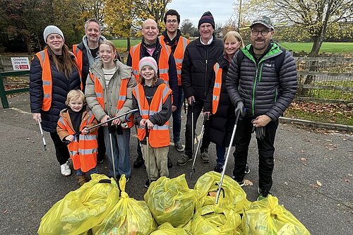 group of people in hi vis and litter pickers 