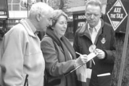 Stephen harvesting signatures for Axe the Tax petition