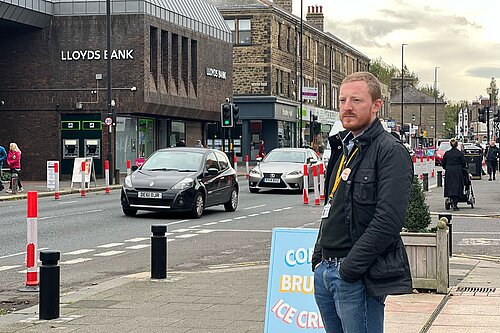 Cllr Colin Ferguson looking out over Gosforth High Street