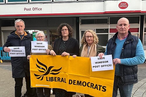 Councillors outside post office 