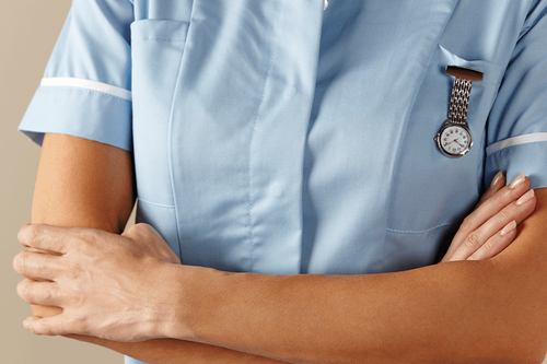 A nurse with arms crossed