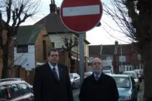 Darren Briddock and Tom McNeice by "No Entry" sign